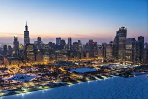 High Prints: USA, Illinois, Chicago. Aerial dusk view of the city and Millennium Park in winter