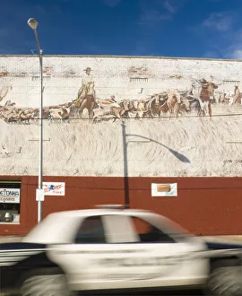 USA, Kansas, Route 66, Baxter Springs, John Gibbins Mural (1991) and police car