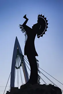 Great Plains Prints: USA, Kansas, Wichita, Keeper of the Plains statue and footbridge on the Arkansas River