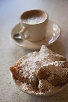 Images Dated 1st March 2010: USA, Louisiana, New Orleans, French Quarter, beignets and cafe au lait at Cafe Du Monde