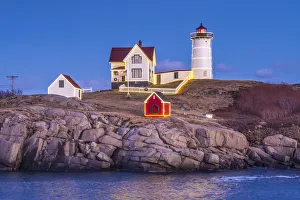 USA, Maine, York Beach, Nubble Light lighthouse, dusk