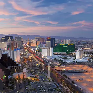 The Strip Prints: USA, Nevada, Las Vegas, Elevated dusk view of the Hotels and Casinos along the Strip
