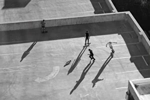 Play Gallery: USA, Nevada, Reno, kids in Reno roller skating on parking garage roof