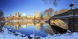 Usa, New York City, Manhattan, Central Park, Bow Bridge and Upper West Side Buildings