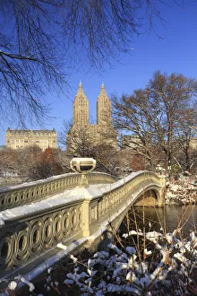 Usa, New York City, Manhattan, Central Park, Bow Bridge and Upper West Side Buildings
