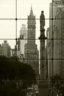Christopher Columbus Prints: USA, New York City, Manhattan, Statue of Christopher Columbus in Columbus Circle viewed through a glass shopping