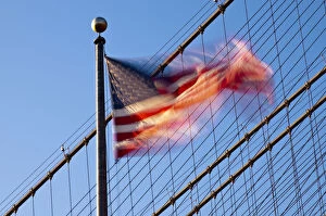 USA, New York, Manhattan, Brooklyn Brisge and Stars and Stripes flag
