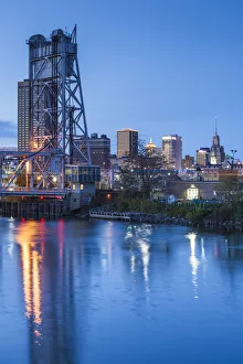 USA, New York, Western New York, Buffalo, skyline and Michigan Avenue Bridge, dusk