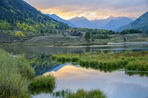 Images Dated 11th January 2022: USA, Rocky Mountains, Colorado, Crested Butte, pond at sunset
