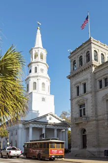 Trams Prints: USA, South Carolina, Charleston. Tram passing under St. Michaels Episcopal Church
