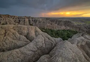 Great Plains Prints: USA, South Dakota, Badlands National Park during summer thunderstorm