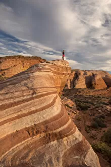 Images Dated 12th November 2015: USA, Southwest, Nevada, Valley of Fire, State Park, Fire Wave, woman standing on sandstone