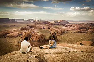 Mittens Prints: Utah - Ariziona border, two young tourists watching the panorama of the Monument Valley