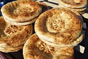 Bukhara Gallery: Uzbek bread in the food market. Bukhara, a UNESCO World Heritage Site. Uzbekistan