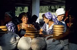 Central Asian Gallery: Uzbek women at a bread stall in the market