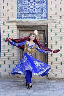 Images Dated 29th November 2022: Uzbekistan, Khiva, Harem of the Tash Kauli complex, an Uzbek woman dressed in traditional costume