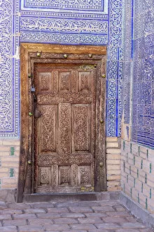 Images Dated 29th November 2022: Uzbekistan, Khiva, Harem of the Tash Kauli complex, an ornate door in the harem for wives