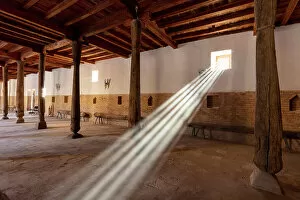 Images Dated 29th November 2022: Uzbekistan, Khiva, Juma mosque, sun rays shine through a window in the Friday mosque where