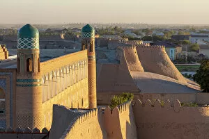 Images Dated 29th November 2022: Uzbekistan, Khiva, Mohammed Amin Khan madrasah and old town walls