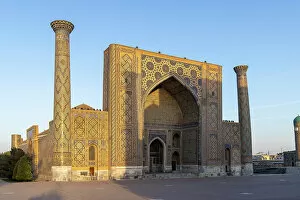 What's New: Uzbekistan, Samarkand, Registan square, Ulugh Beg Madrasah at sunrise