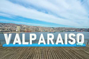 Images Dated 4th August 2022: Valparaiso sign with city in background, Baron pier, Valparaiso, Valparaiso Province