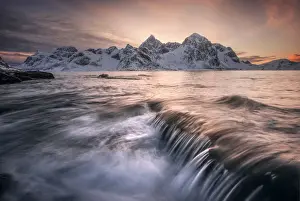 Vareid beach during a winter sunset in Lofoten islands, Norway