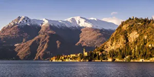 Varenna, Lake Como, Lombardy, Italy. Winter sunset over Varenna with some snow