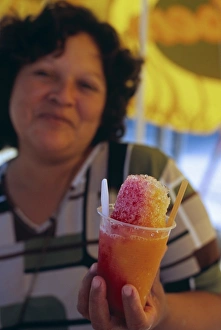Seller Gallery: A vendor serves up a shaved ice treat on the beach at Mancora