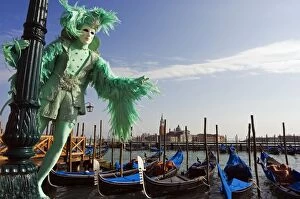Festivity Gallery: Venice Carnival People in Costumes and Masks on Canal