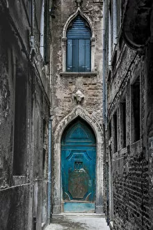 Images Dated 19th January 2018: Venice, Veneto, Italy. Blue moorish door in a narrow street
