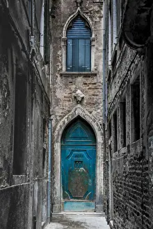 Venice Prints: Venice, Veneto, Italy. Blue moorish door in a narrow street