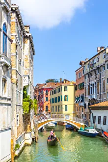 Venice, Veneto, Italy. Buildings and gondola