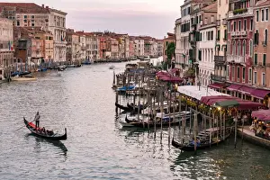 Venice, Veneto, Italy. Buildings and gondola from Rialto Bridge