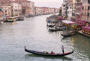 Gondolier Prints: Venice, Veneto, Italy. Buildings and gondola from Rialto Bridge