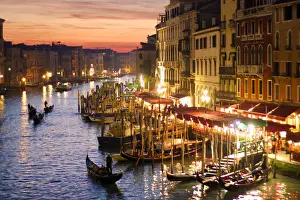 Venice, Veneto, Italy. Gondolas and the Grand Canal from Rialto Bridge at sunset
