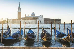 Images Dated 6th February 2018: Venice, Veneto, Italy. Gondolas moored in Riva degli Schiavoni and San Giorgio Maggiore