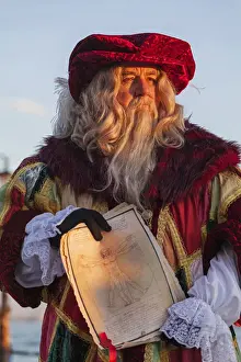 Style Prints: Venice, Veneto, Italy. Leonardo da Vincis mask at Venice Carnival at sunset