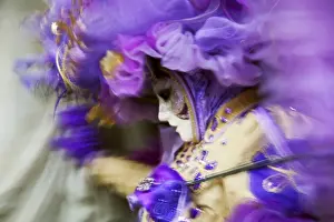 World Prints: Venice, Veneto, Italy; A mask in movement on Piazza San Marco during Carnival