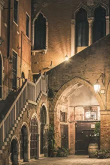 Venice, Veneto, Italy. Old courtyard at night