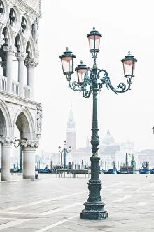 Bell Tower Collection: Venice, Veneto, Italy. Piazzetta San Marco and the waterfront on a misty morning