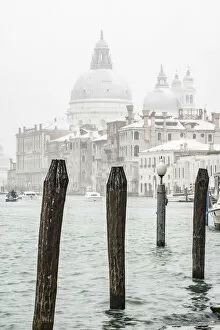 White Gallery: Venice, Veneto, Italy. St Mary of Health basilica under a snowfall