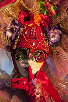 Venice, Veneto, Italy. A traditional mask at Venice Carnival, one of the oldest Carnival