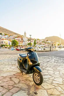 Cycle Gallery: A Vespa motor cycle by the Harbour in Halki, Dodecanese Islands, Greece
