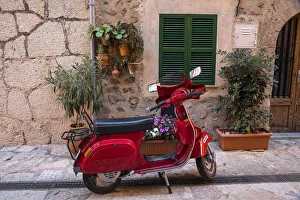 Vespa in the street in Valldemossa, Serra de Tramuntana, Mallorca (Majorca), Balearic Vespa in the street in Valldemossa, Serra de Tramuntana, Mallorca (Majorca), Balearic