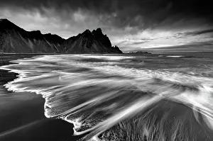 Southeast Iceland Prints: Vestrahorn mountain in winter, with waves washing up the black sand beach