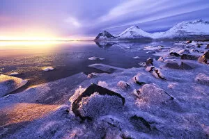 Images Dated 22nd April 2022: The Vestrahorn reflected in the bay during a winter sunrise, Austurland, Southern Iceland
