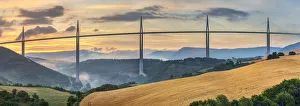 Viaduc de Millau bridge over Tarn river valley at sunrise, Millau, Aveyron Department