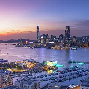 Tsim Sha Tsui Prints: Victoria Harbour and Tsim Sha Tsui skyline at sunset, Hong Kong, China