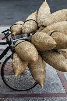 Images Dated 10th March 2015: Vietnam, Ho Chi Minh City, bicycle with wicker baskets