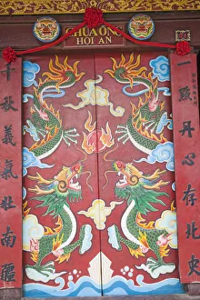Images Dated 30th March 2011: Vietnam, Hoi An, Quan Cong Temple, Entrance Doorway depicting Dragons